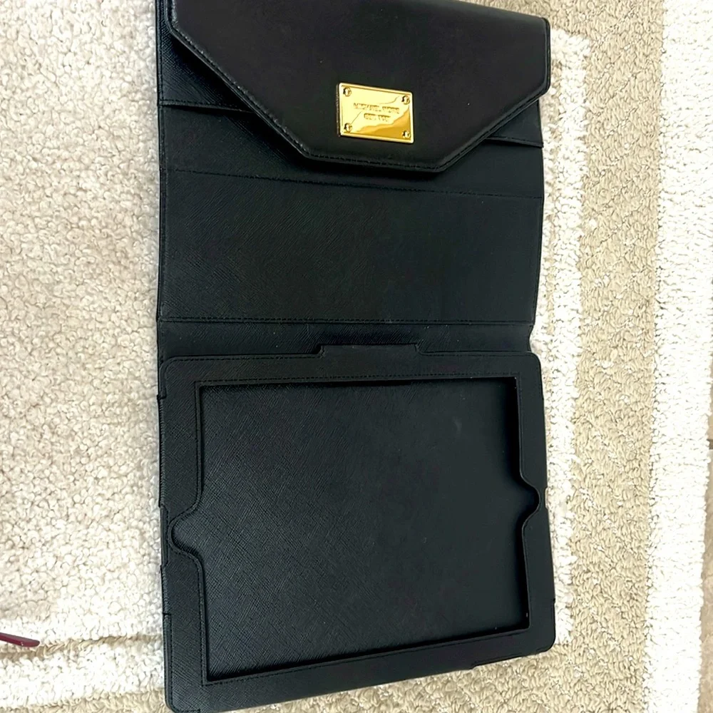 Michael Kors Tablet Case Black with card slots and pen holder.